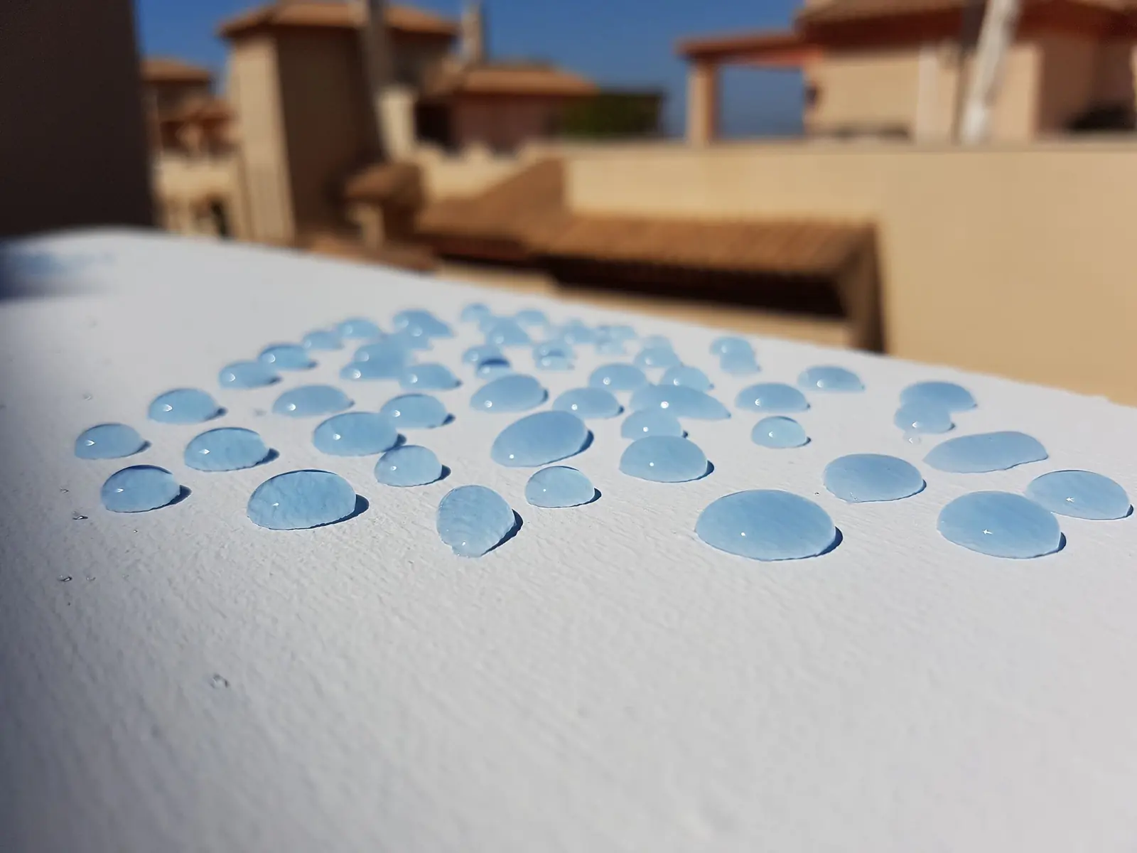Rain beading on a treated surface