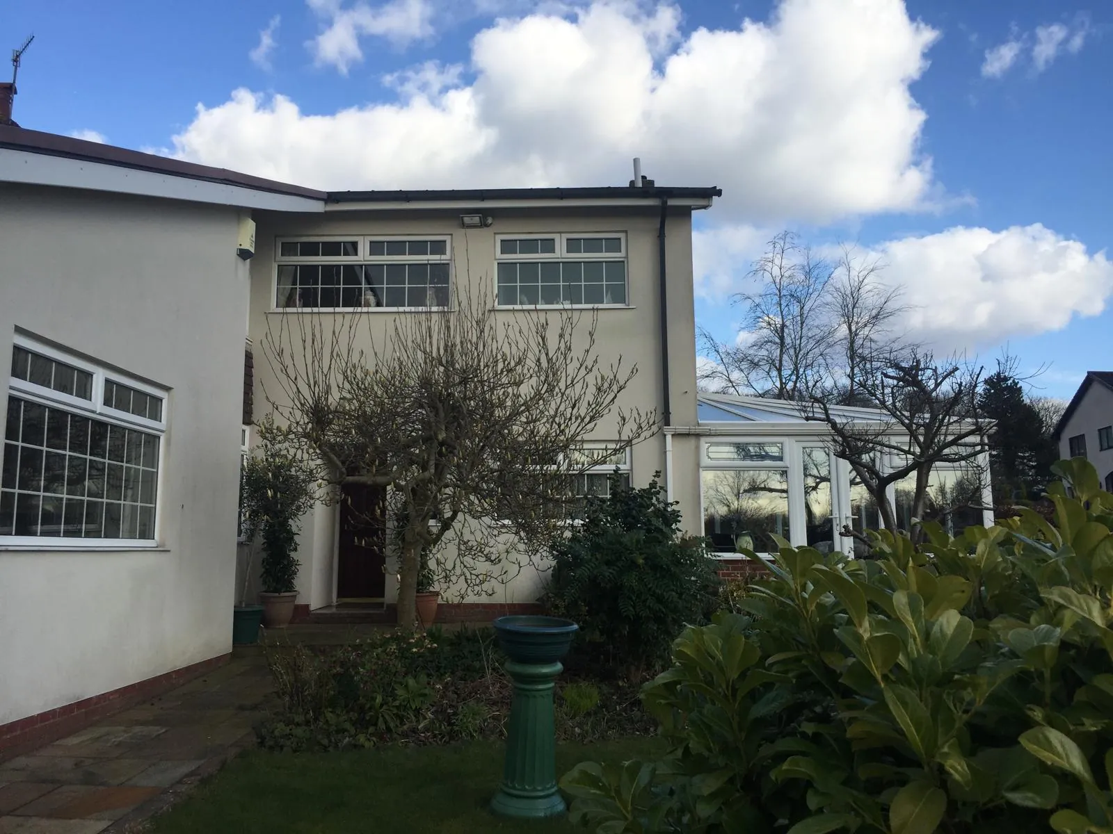 Rear of a detached house with a clean bright coating
