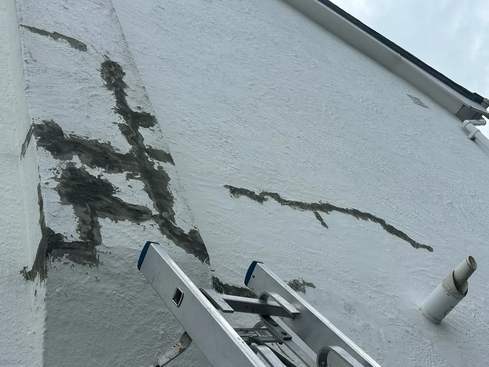 Gable wall with blown render cut out and filled