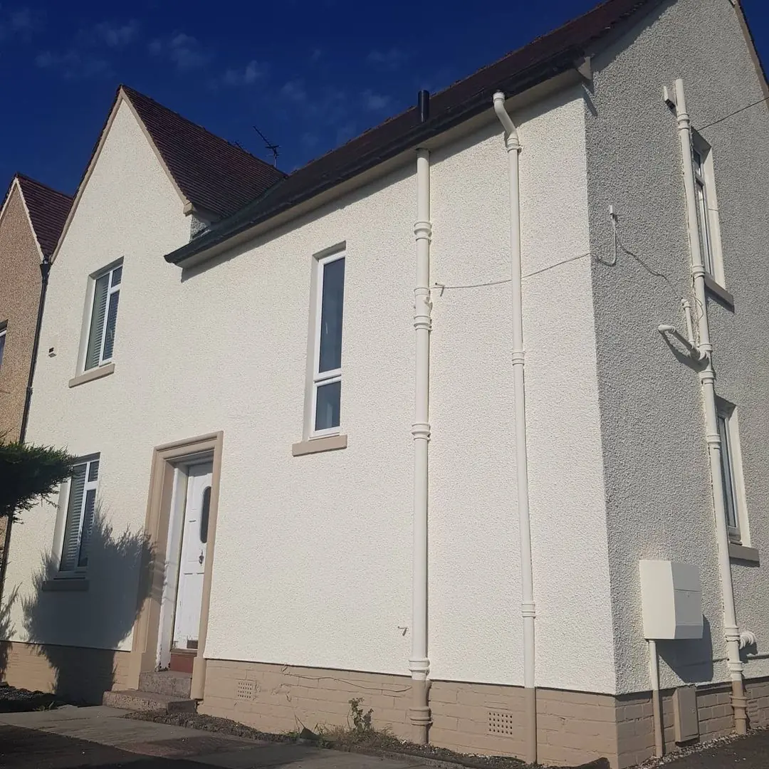 The same house after cleaning and coating